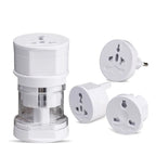 Set of white travel adapters on a white background