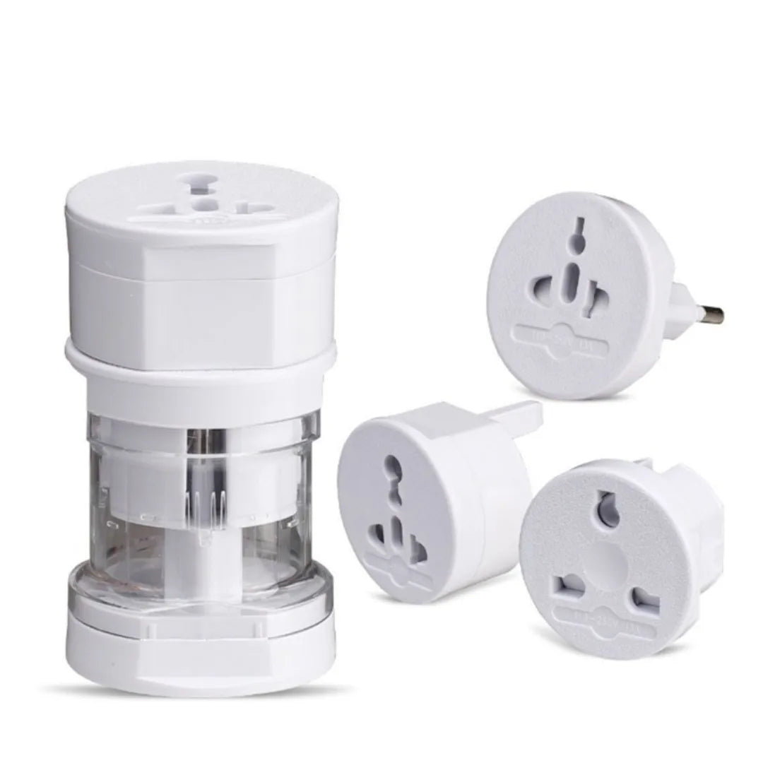 Set of white travel adapters on a white background