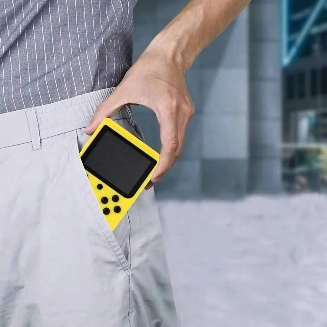 Person holding a yellow handheld device with a screen, blurred cityscape background