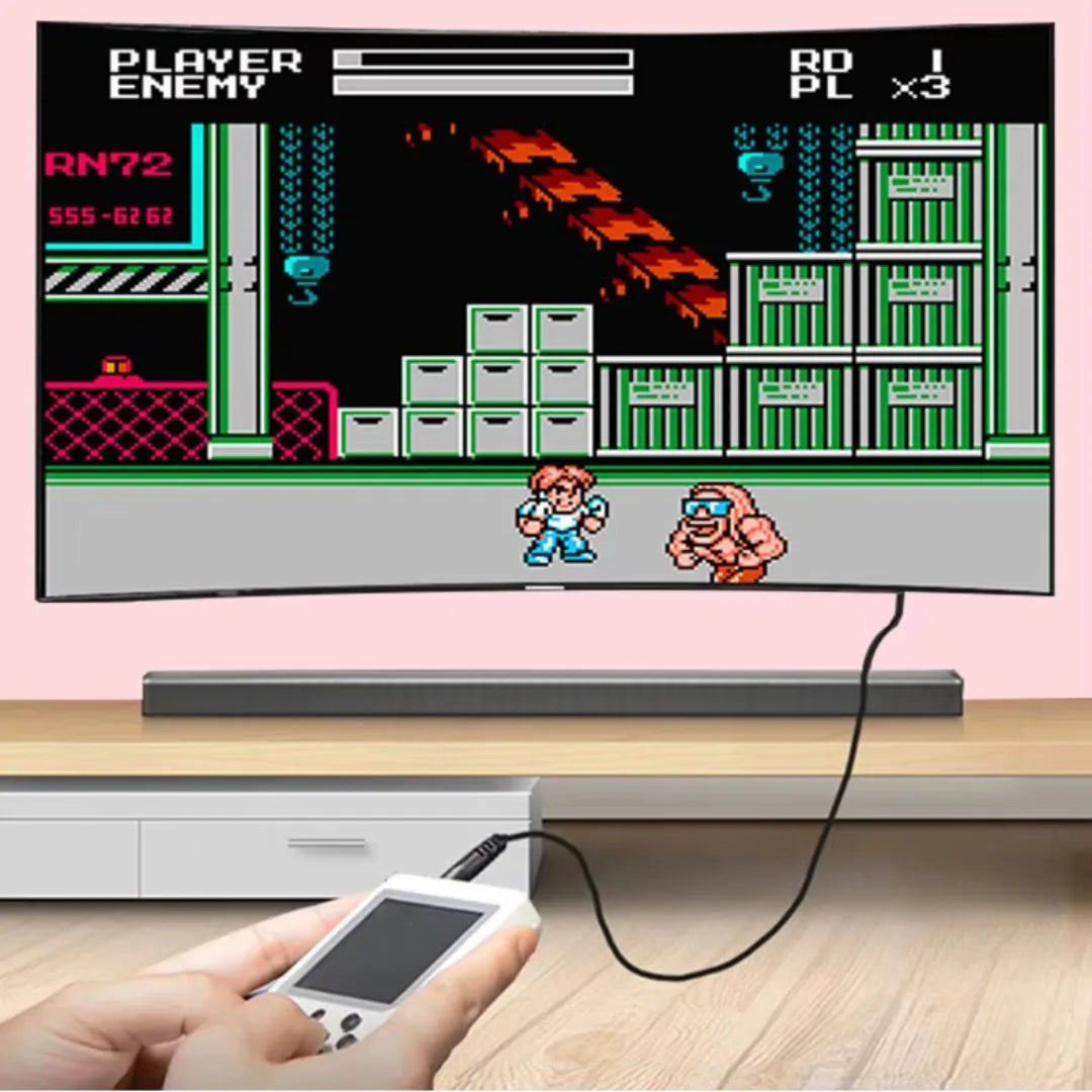 Hand holding a handheld gaming device connected to a TV displaying a retro video game.