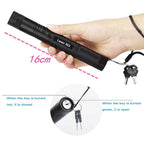 Black laser pointer held by a hand with keychain illustration showing lock mechanism
