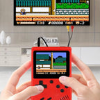 Handheld gaming console displaying a classic game with a TV in the background.