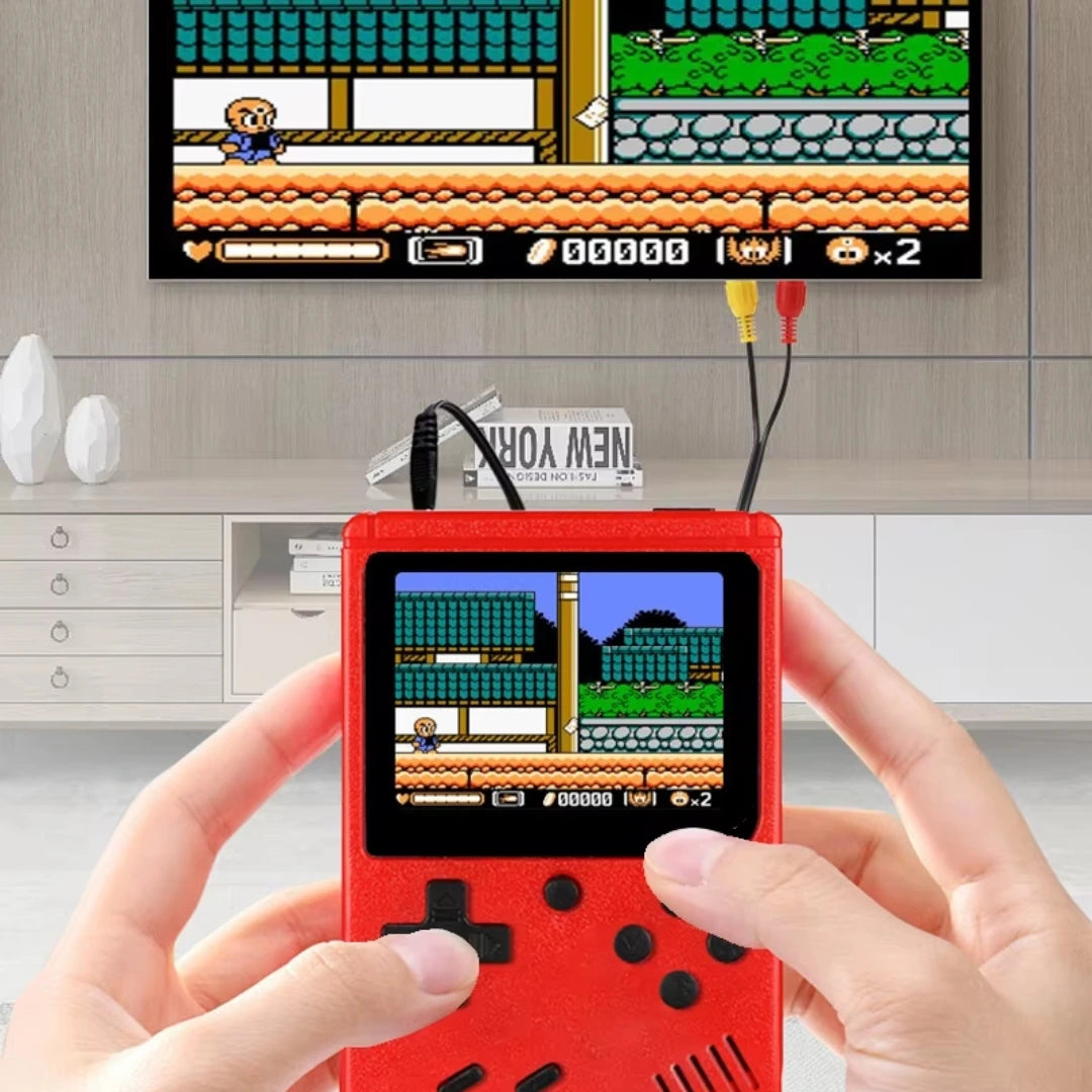 Handheld gaming console displaying a classic game with a TV in the background.