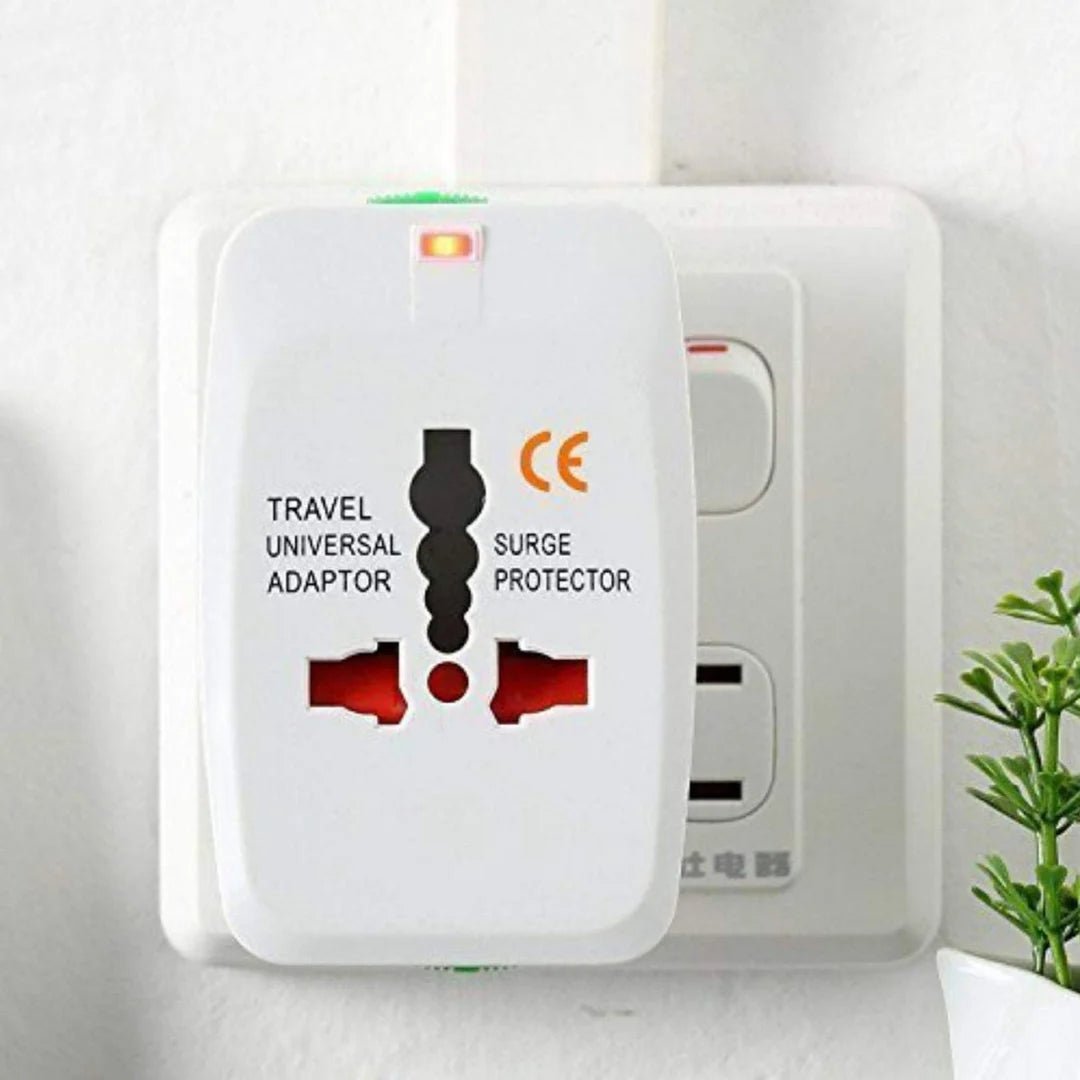 Travel universal adapter with surge protector on a white background