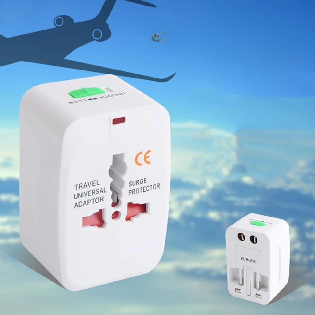 Travel universal adapter with CE marking against a sky background