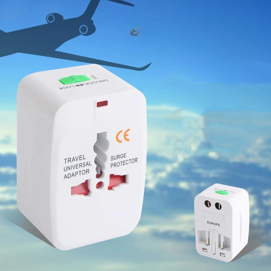 Travel universal adapter with CE marking against a sky background